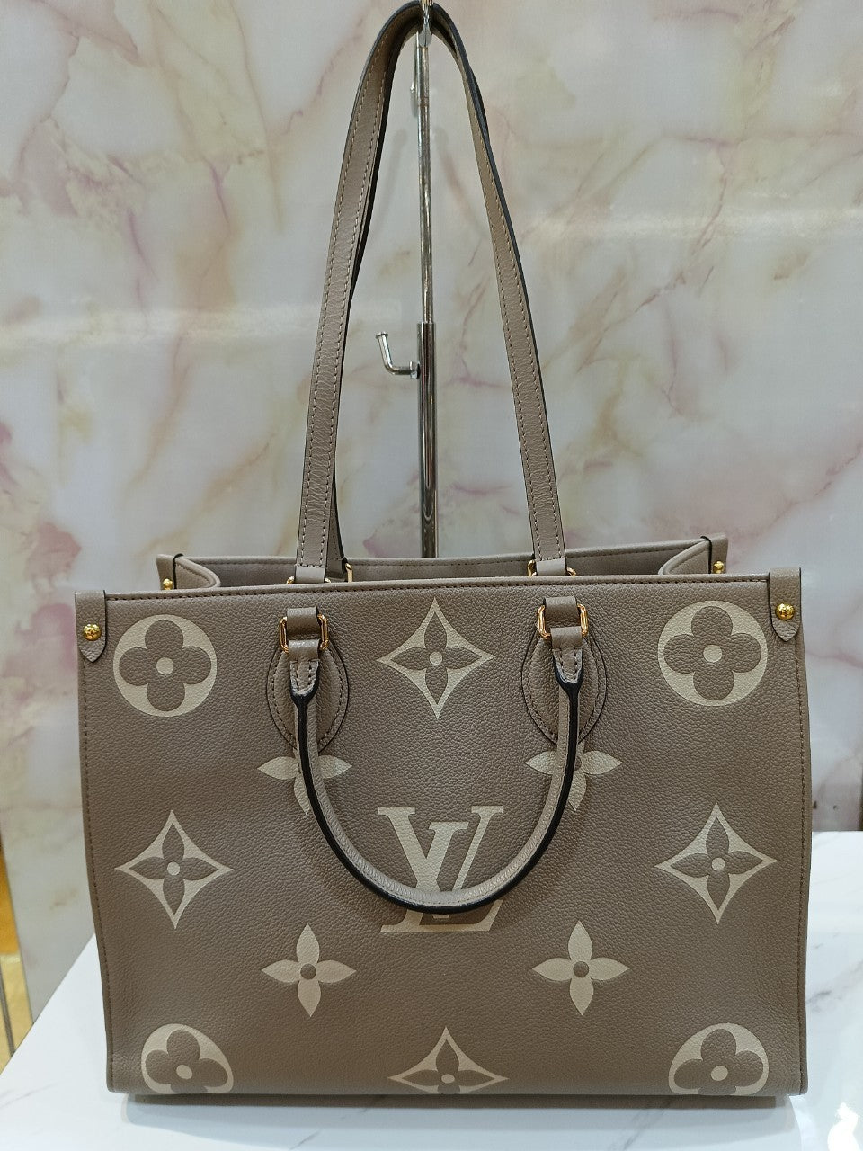 LV OTG MM Monogram Empreinte Tourterelle Cream 2022 (CHIP)