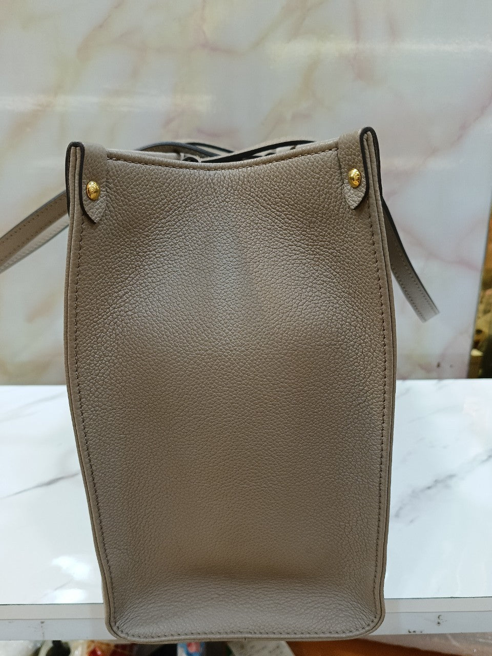 LV OTG MM Monogram Empreinte Tourterelle Cream 2022 (CHIP)