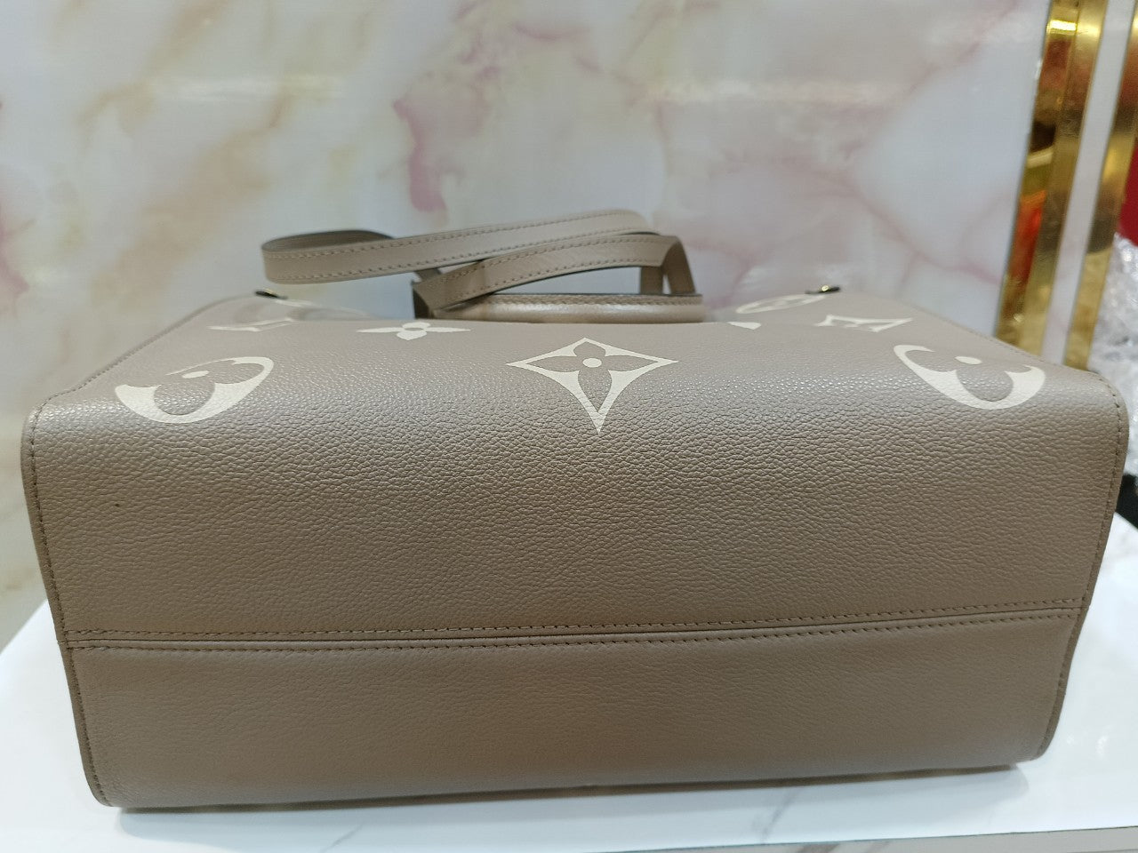 LV OTG MM Monogram Empreinte Tourterelle Cream 2022 (CHIP)