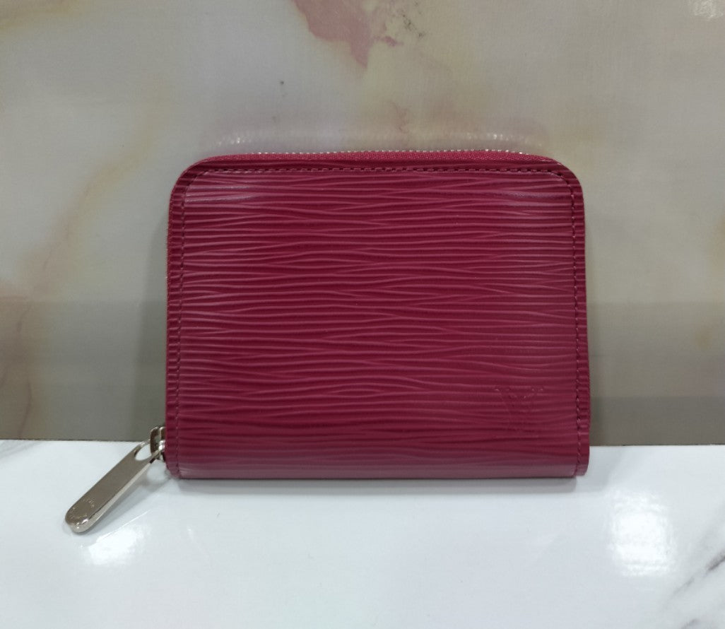 LV Zippy Coin Purse Epi Fuchsia
Good Condition
