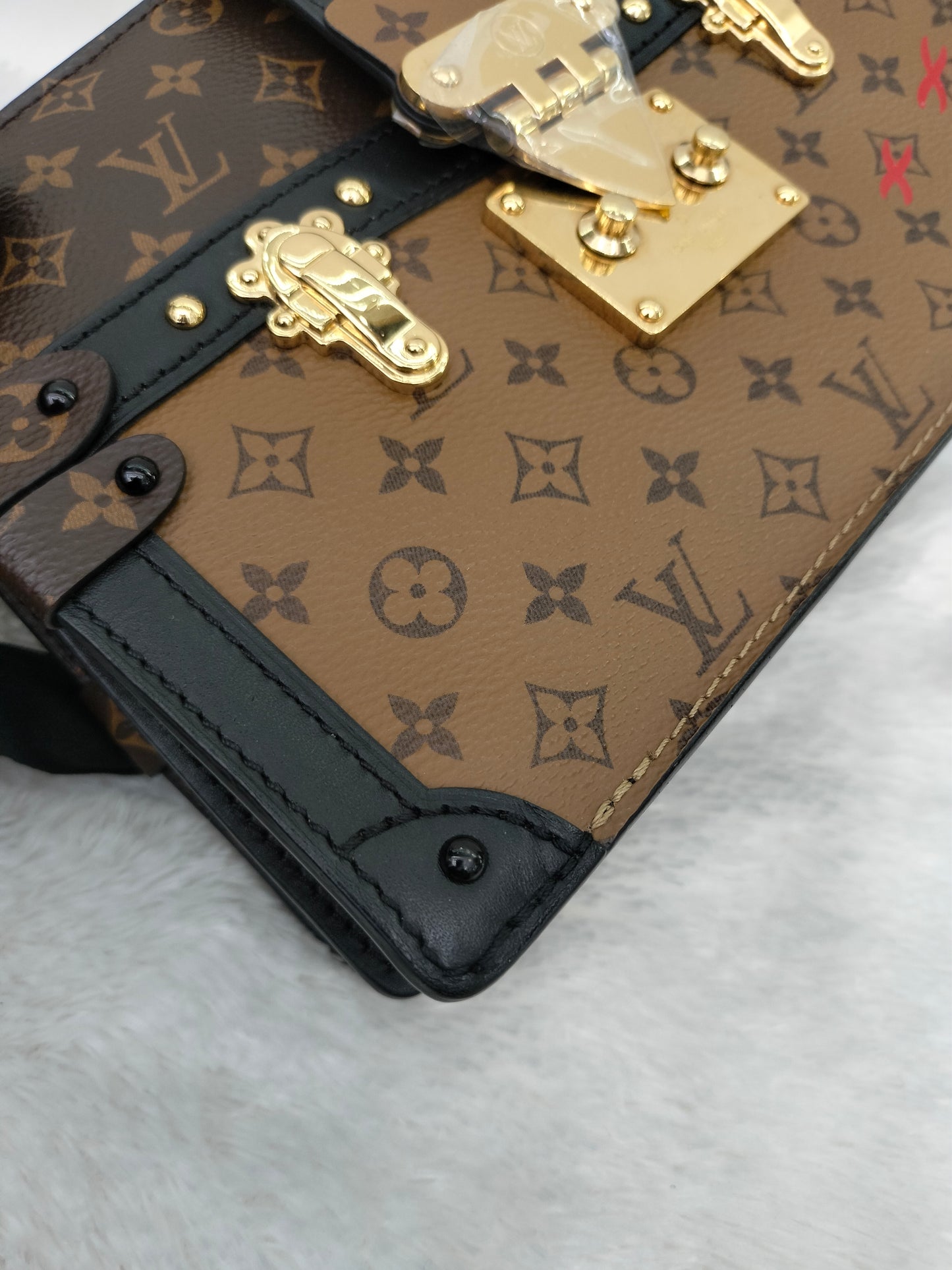 LV Trunk Clutch Monogram Reverse 2018