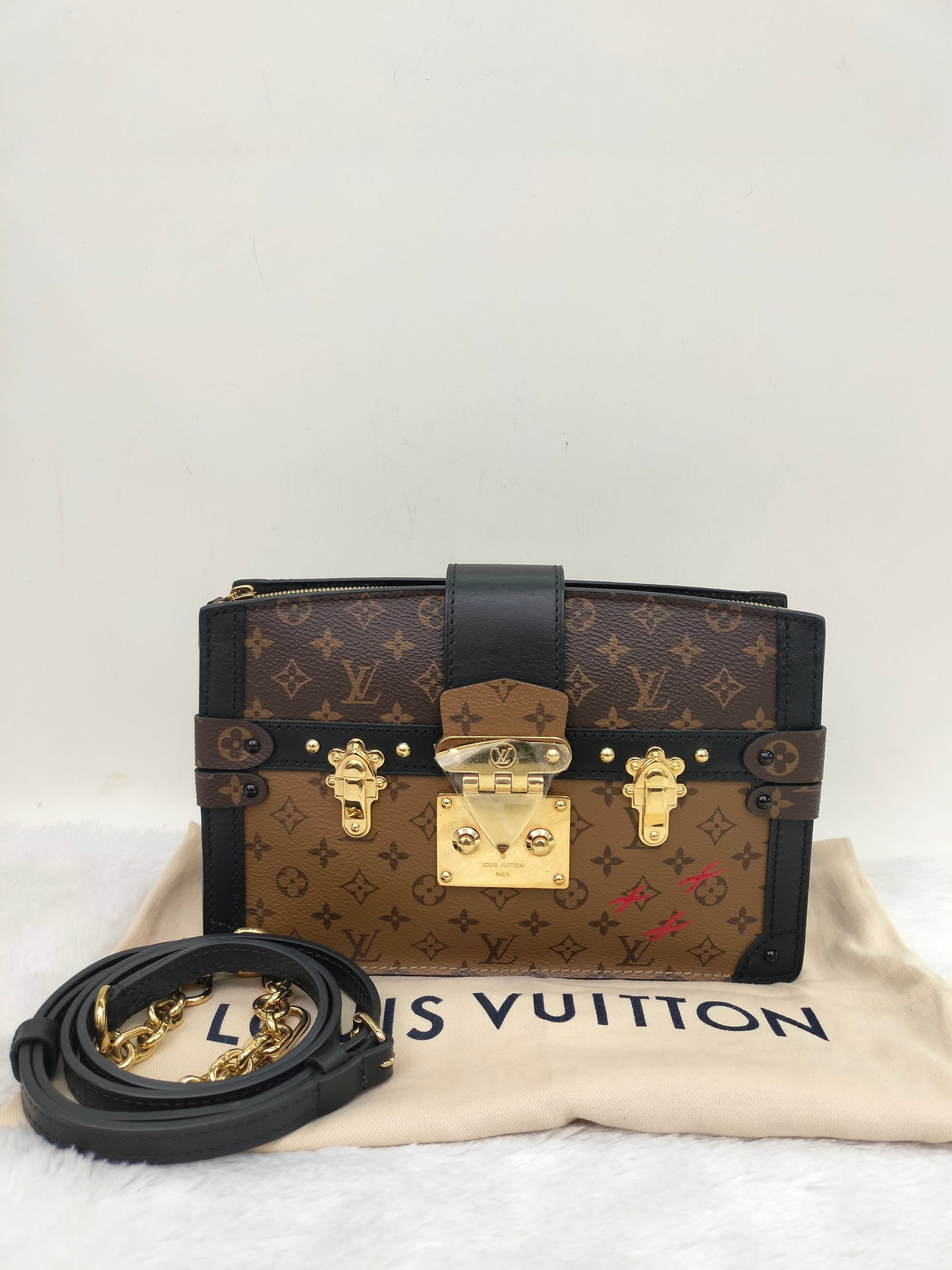 LV Trunk Clutch Monogram Reverse 2018