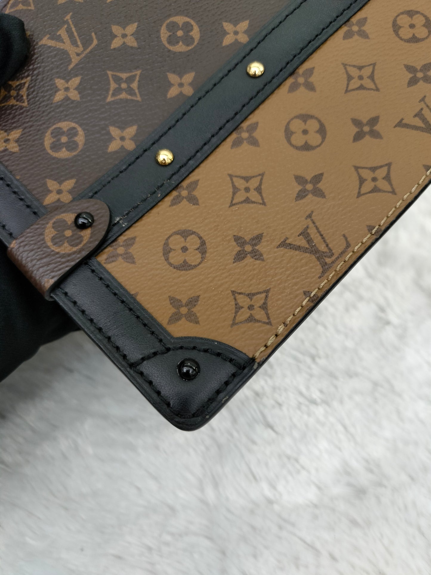 LV Trunk Clutch Monogram Reverse 2018