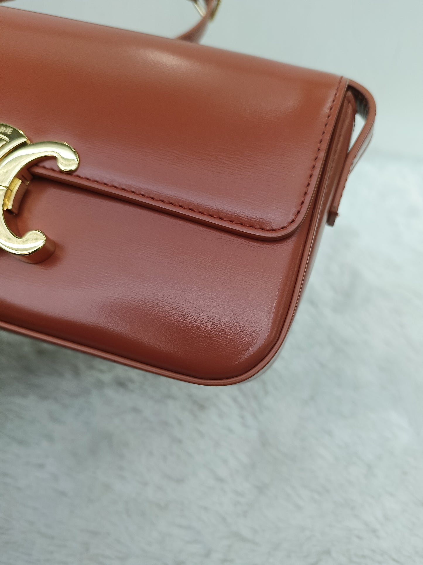 Celine Triomphe East West Calfskin Cornelian GHW 2022