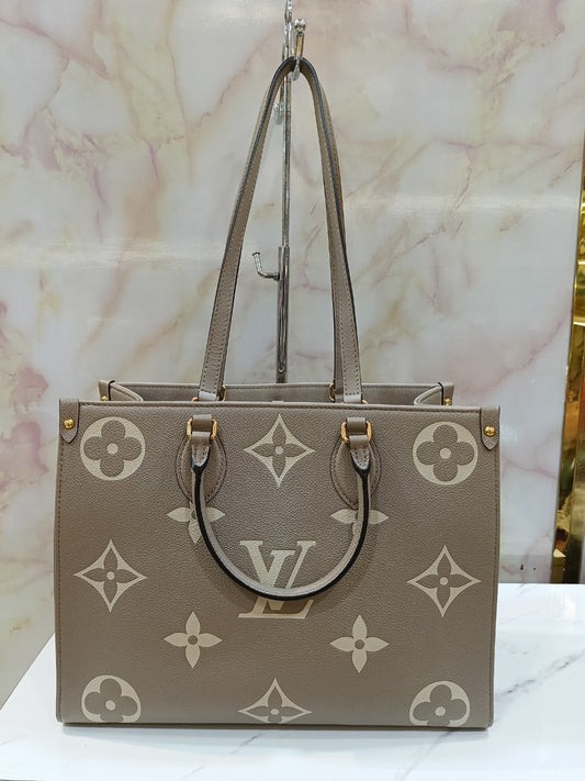 LV OTG MM Monogram Empreinte Tourterelle Cream 2022 (CHIP)