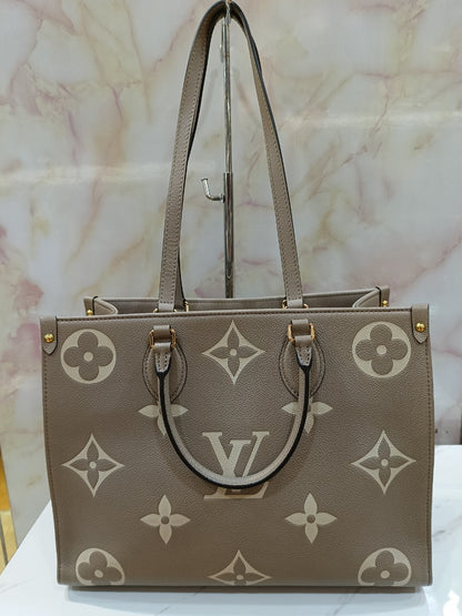 LV OTG MM Monogram Empreinte Tourterelle Cream 2022 (CHIP)