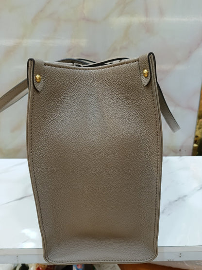 LV OTG MM Monogram Empreinte Tourterelle Cream 2022 (CHIP)
