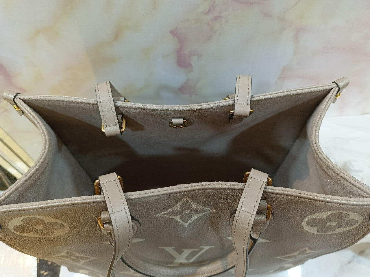 LV OTG MM Monogram Empreinte Tourterelle Cream 2022 (CHIP)