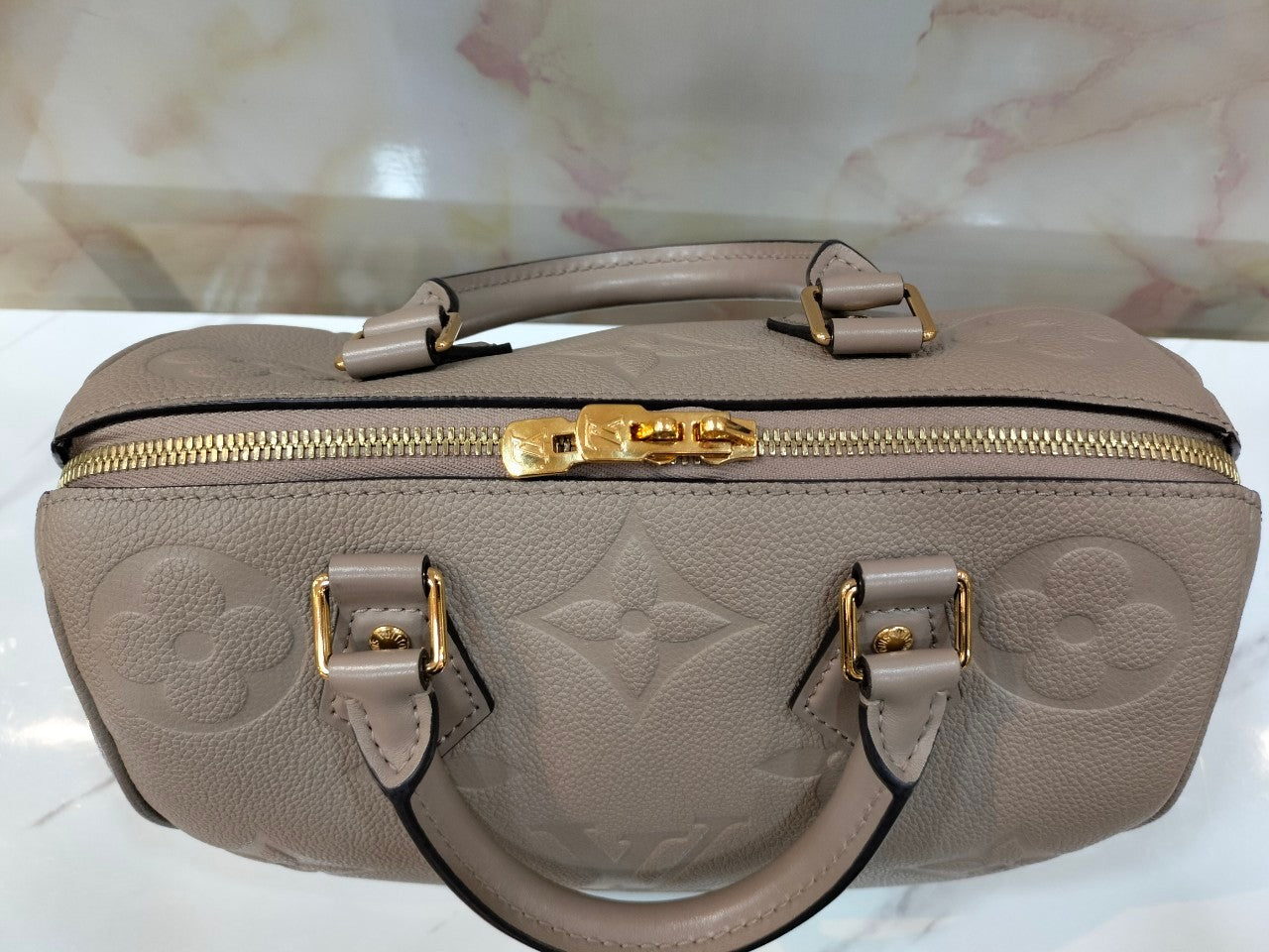 LV Bandou 25 Monogram Empreinte Gris Tourtelle 2023