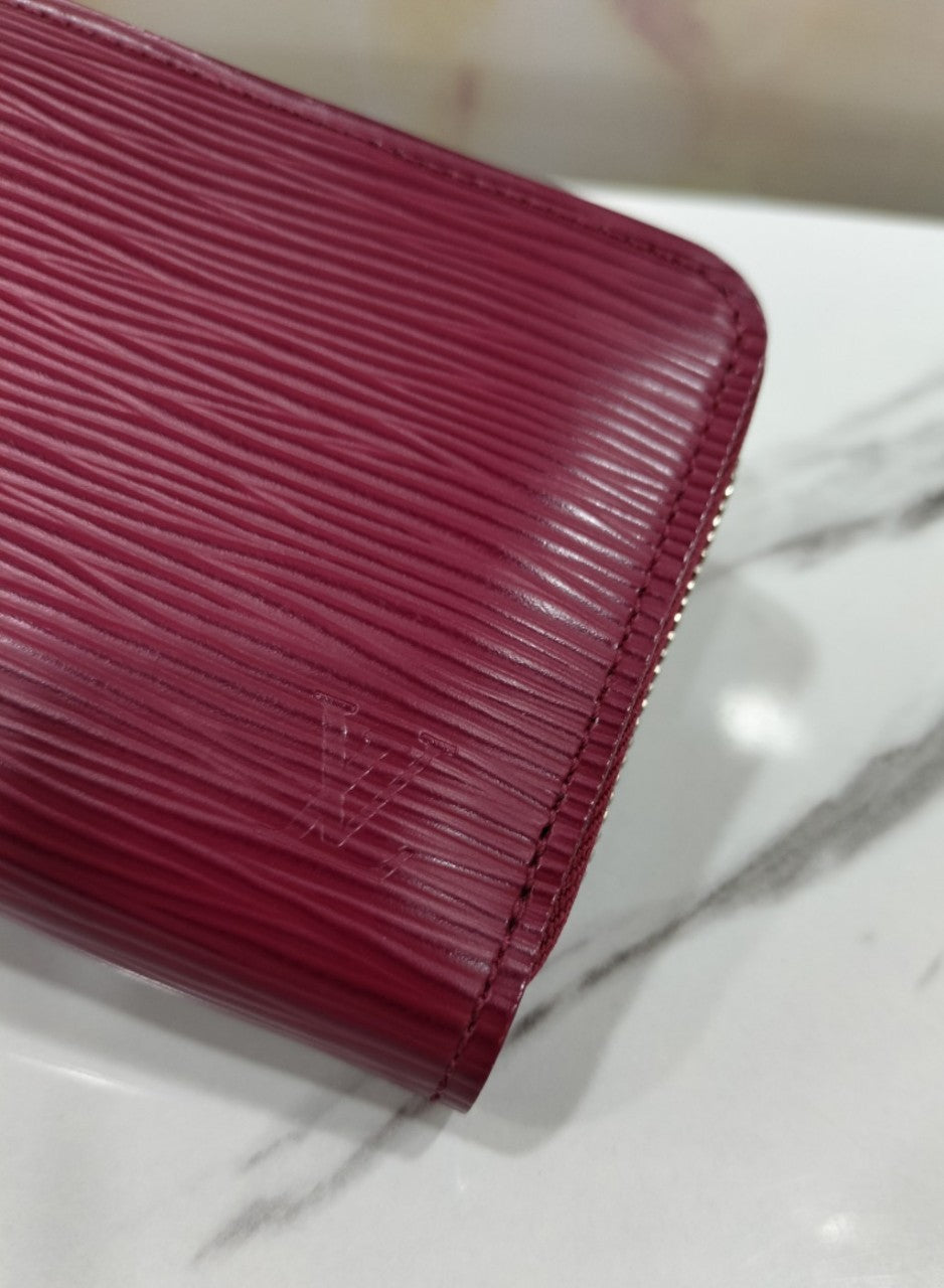 LV Zippy Coin Purse Epi Fuchsia
Good Condition