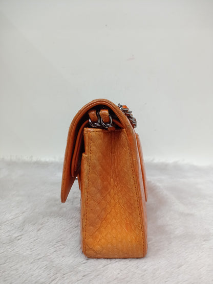 Chanel Medium Exotic Python Orange RHW DF #19
With holo, holo checker, dustbag