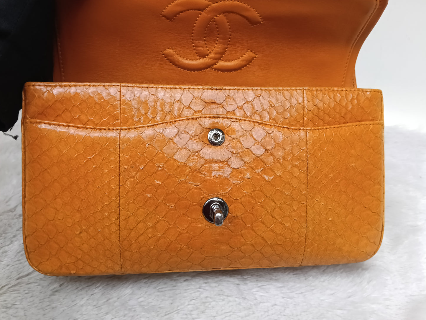 Chanel Medium Exotic Python Orange RHW DF #19
With holo, holo checker, dustbag