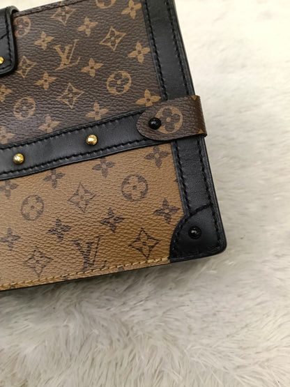 LV Trunk Clutch Monogram Reverse 2019
