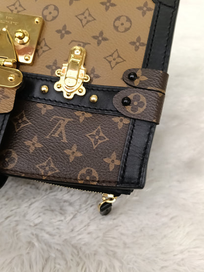 LV Trunk Clutch Monogram Reverse 2019