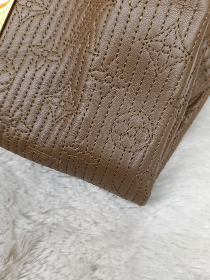 LV Altair Clutch Monogram Jacquard Brown 2012
