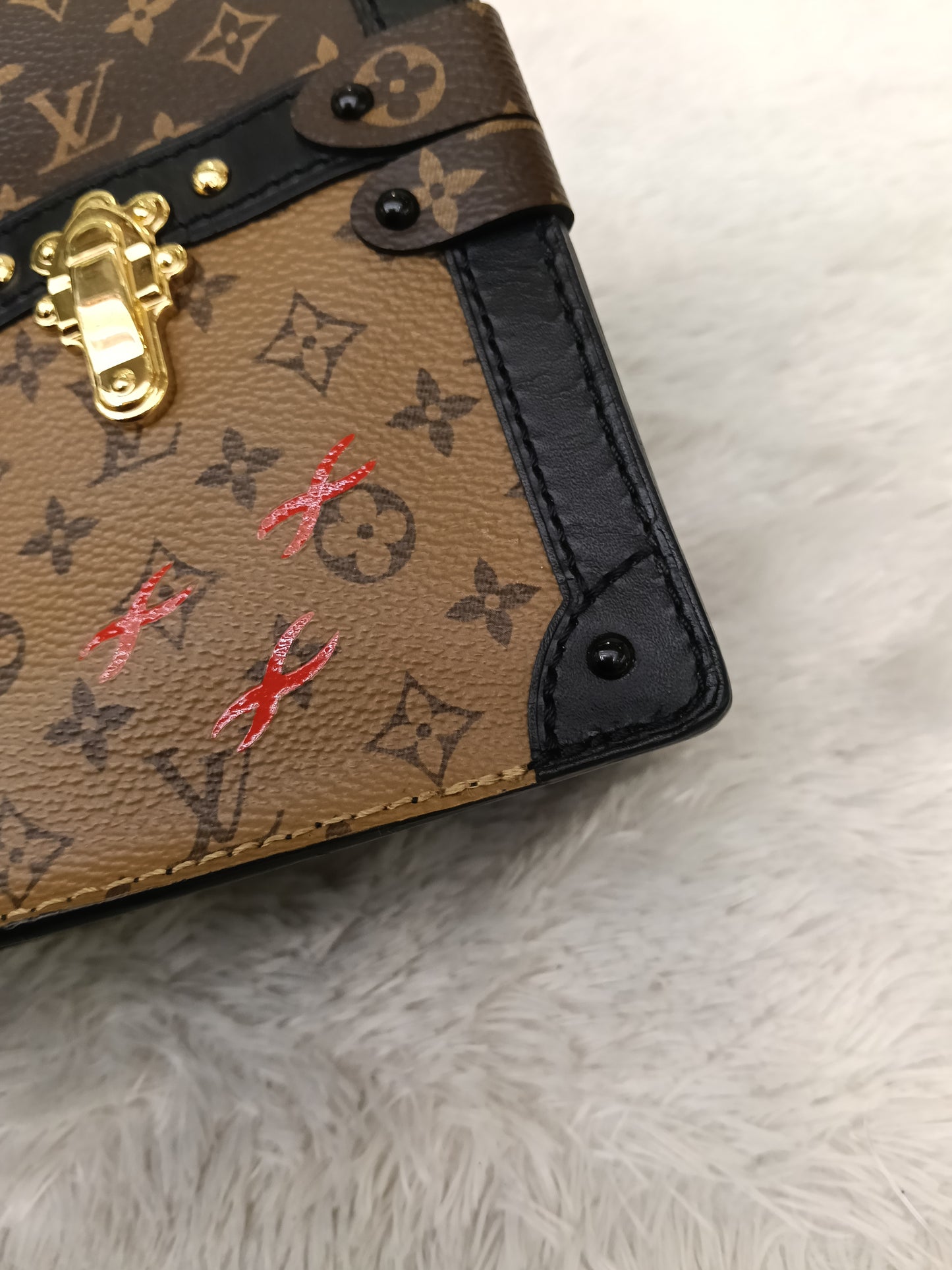 LV Trunk Clutch Monogram Reverse 2019
