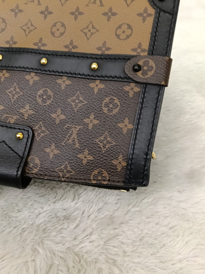 LV Trunk Clutch Monogram Reverse 2019
