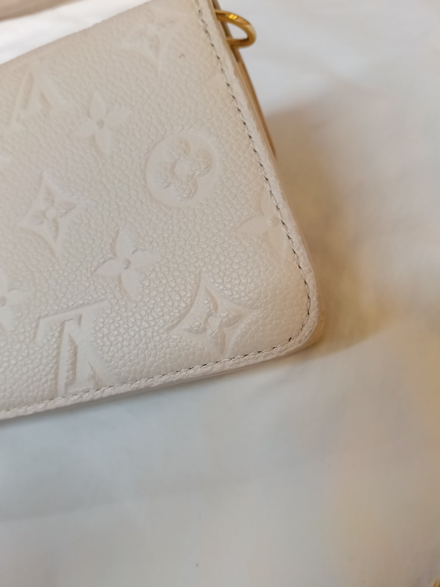LV WOC Metis Monogram Empreinte Creme (CHIP)