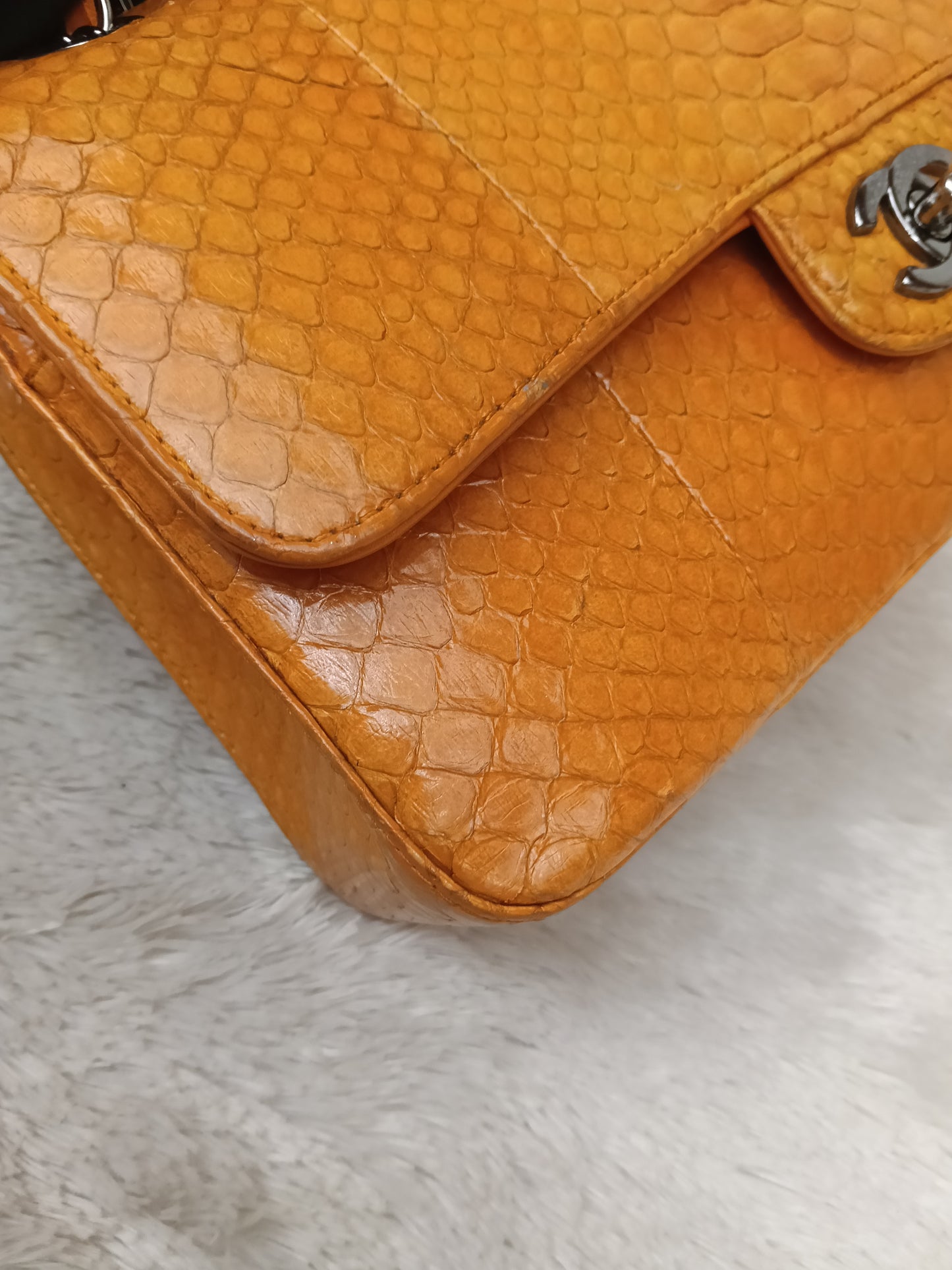 Chanel Medium Exotic Python Orange RHW DF #19
With holo, holo checker, dustbag