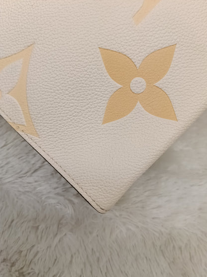 LV Pochette Toiletry 26 Monogram Giant Empreinte Pool Creme (CHIP)