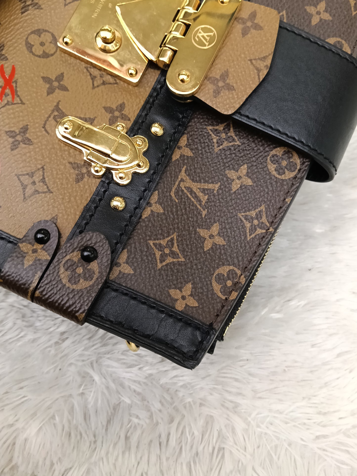 LV Trunk Clutch Monogram Reverse 2019