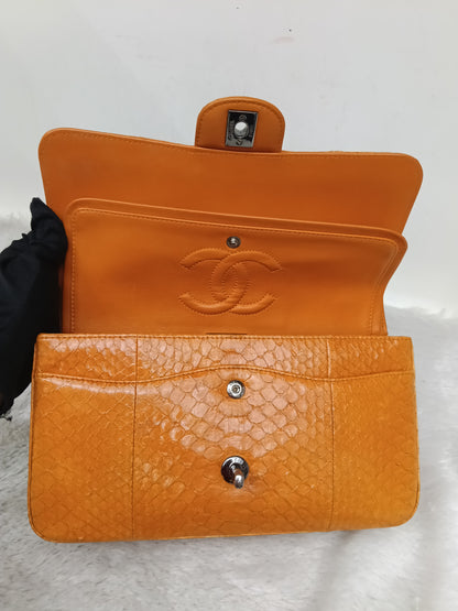 Chanel Medium Exotic Python Orange RHW DF #19
With holo, holo checker, dustbag