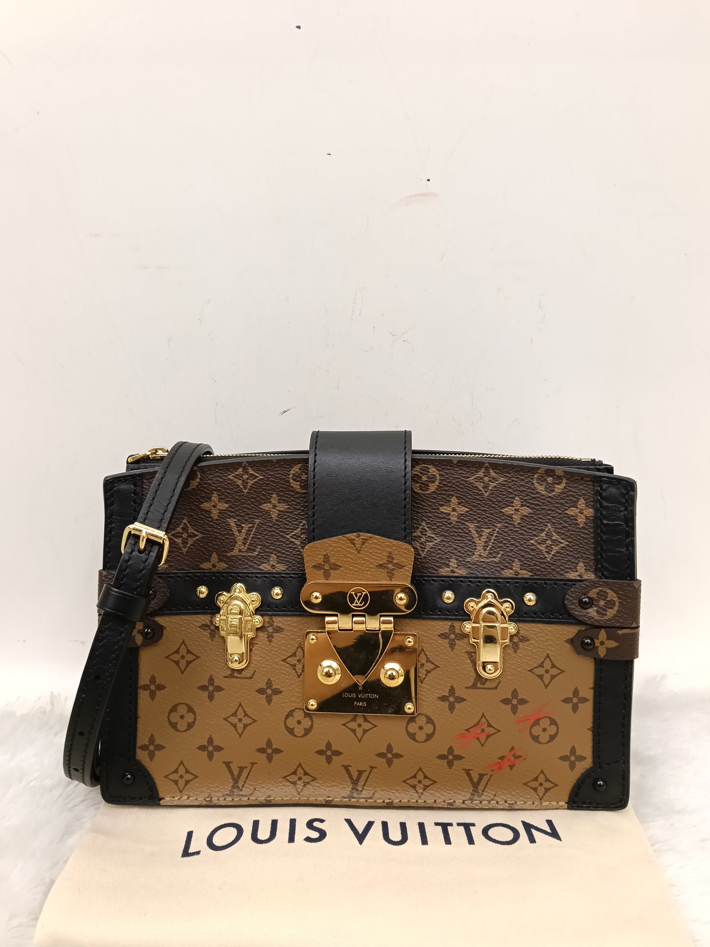 LV Trunk Clutch Monogram Reverse 2019