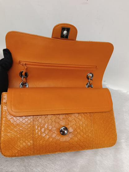 Chanel Medium Exotic Python Orange RHW DF #19
With holo, holo checker, dustbag