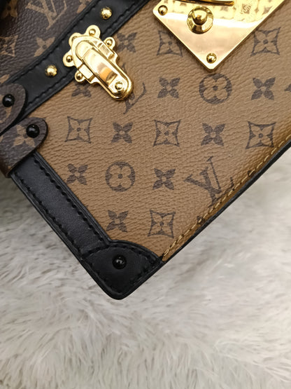 LV Trunk Clutch Monogram Reverse 2019