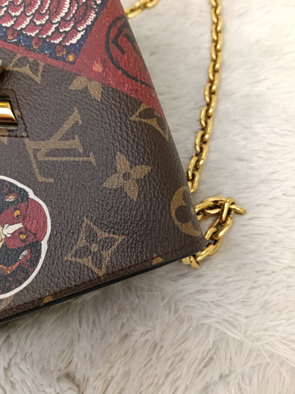 LV Twist Chain Wallet Monogram Kabuki 2017
