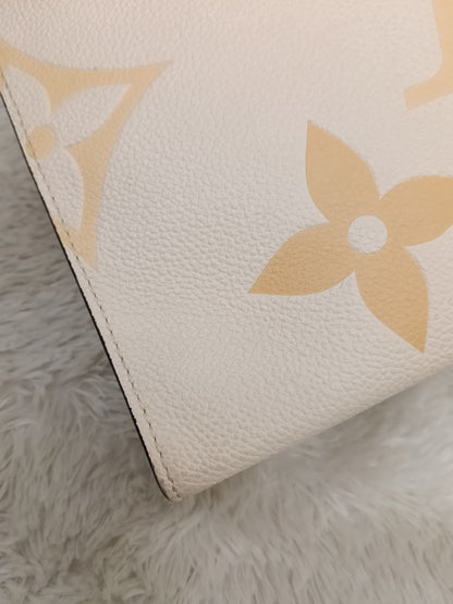 LV Pochette Toiletry 26 Monogram Giant Empreinte Pool Creme (CHIP)