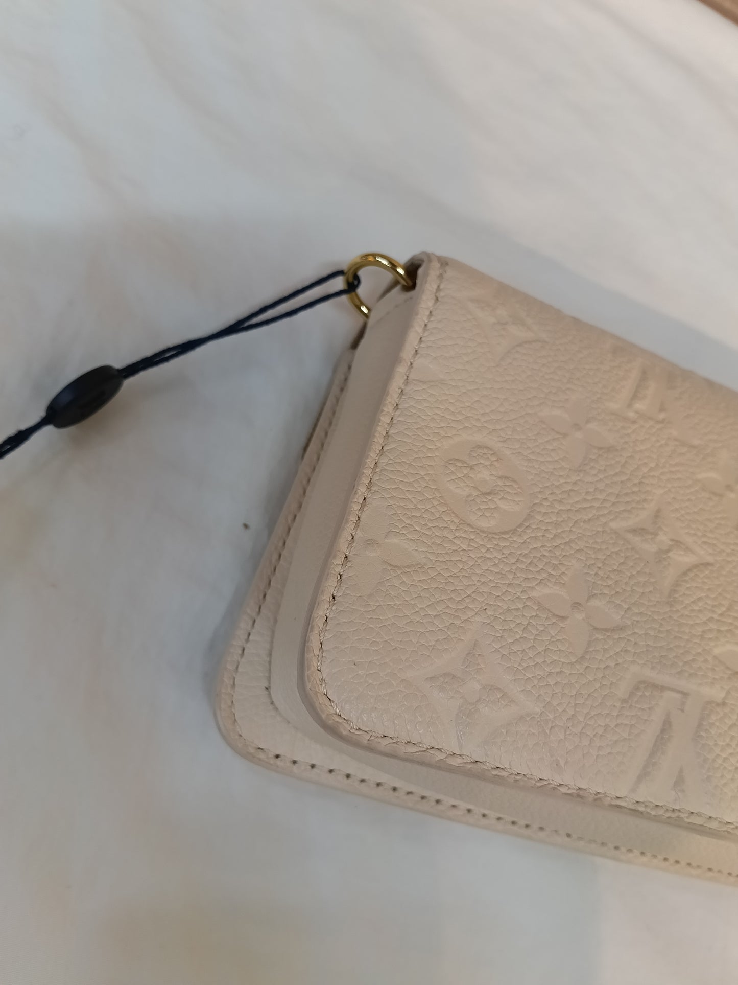 LV WOC Metis Monogram Empreinte Creme (CHIP)