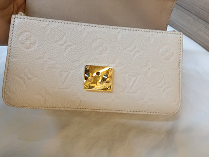 LV WOC Metis Monogram Empreinte Creme (CHIP)