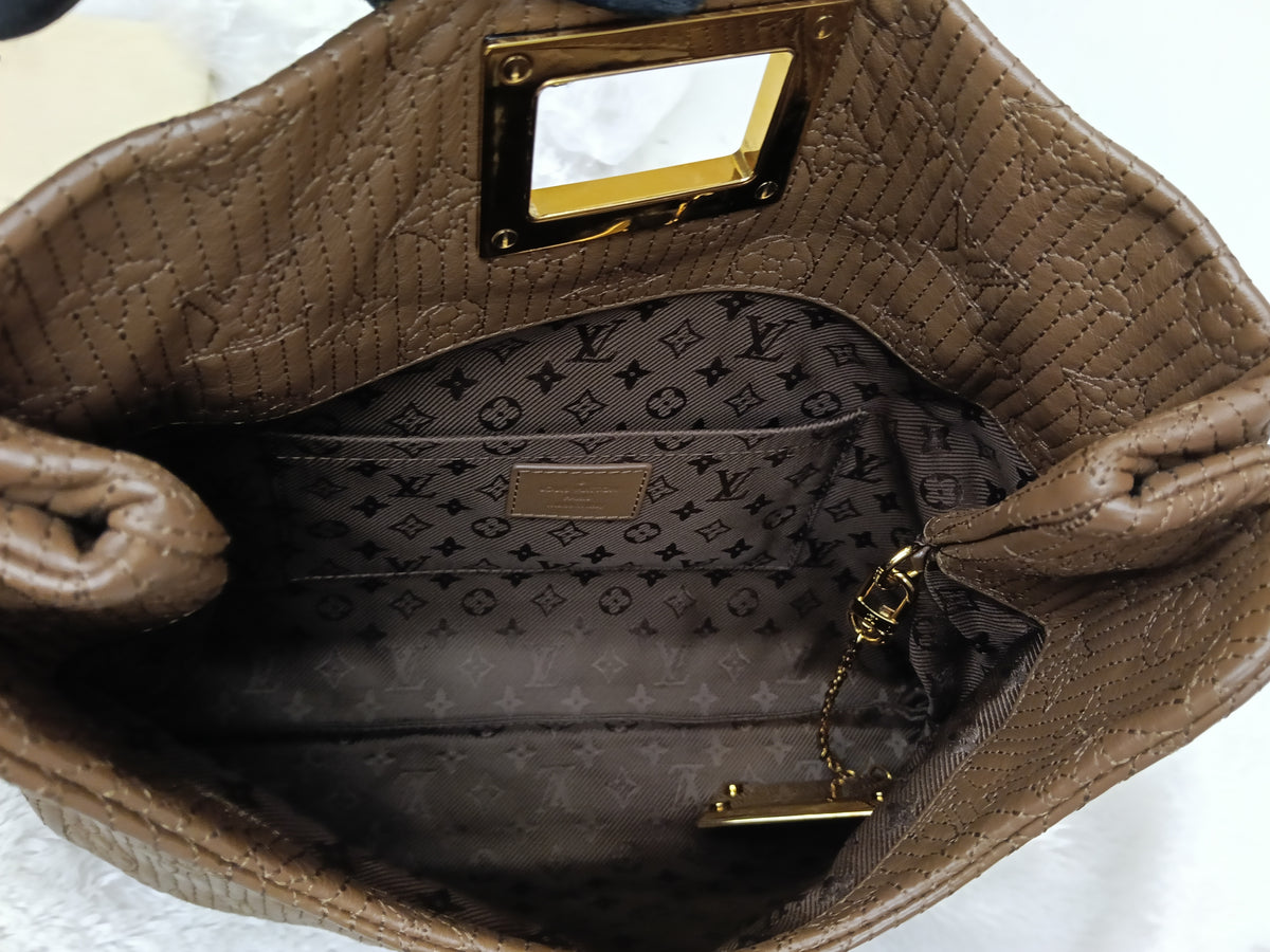 LV Altair Clutch Monogram Jacquard Brown 2012
