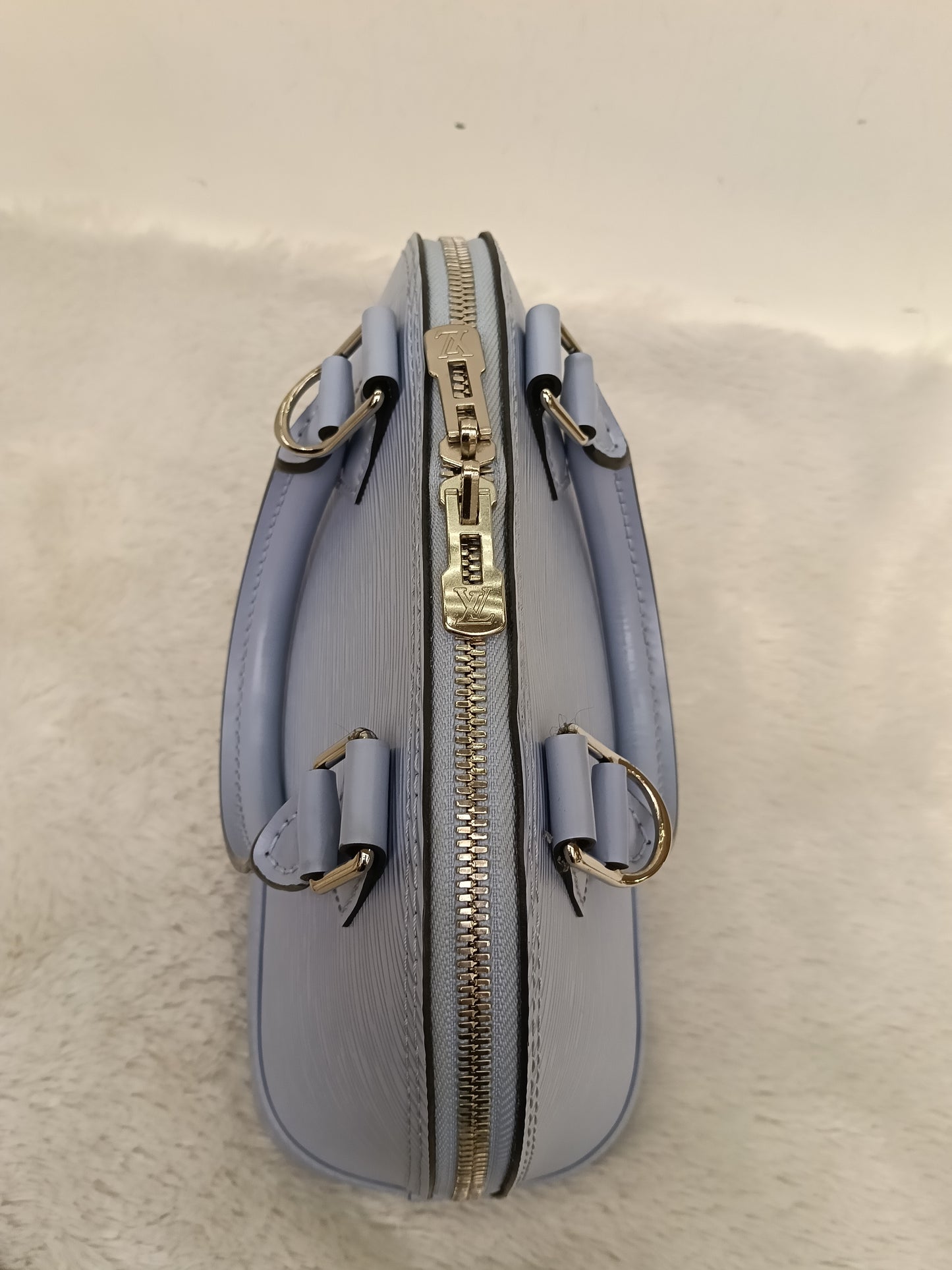 LV Alma BB Epi Bleu Nuage (CHIP)