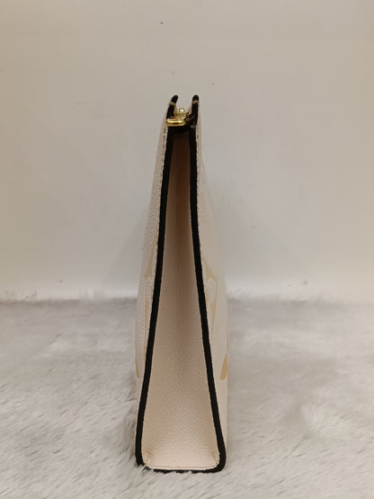 LV Pochette Toiletry 26 Monogram Giant Empreinte Pool Creme (CHIP)