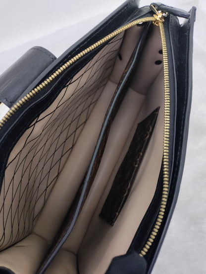 LV Trunk Clutch Monogram Reverse 2018