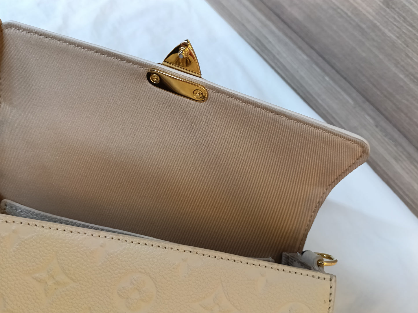 LV WOC Metis Monogram Empreinte Creme (CHIP)