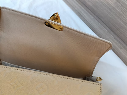 LV WOC Metis Monogram Empreinte Creme (CHIP)
