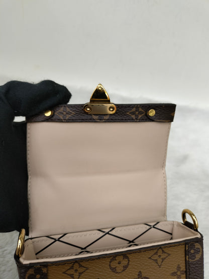 LV Pochette Trunk Vertical Monogram Reverse 2019