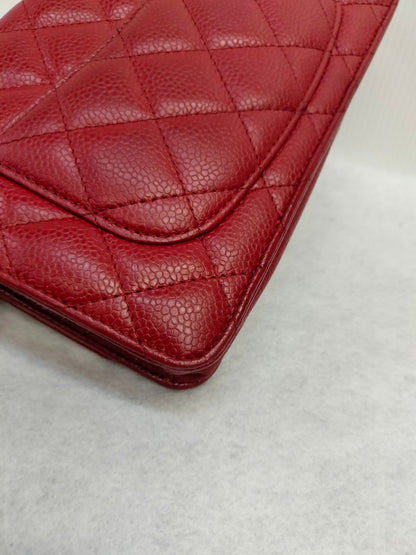 Chanel WOC Caviar Red SHW #19.                Size 20x11x3cm
